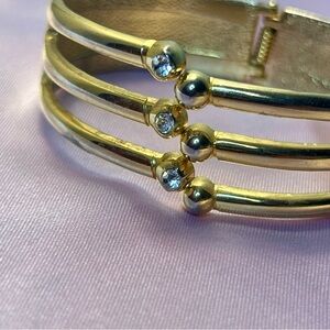 Elegant Gold Bracelet with Silver Accents